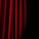 spotlight on a red curtain